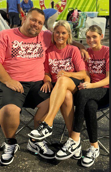 Young couple going through their finances while paying bills at home.